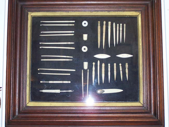 A framed grouping of 34 Whalebone Sewing Implements from the 19th century